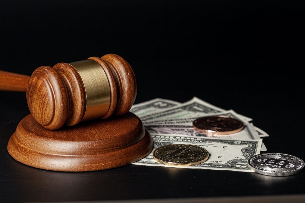 Law mallet and a stack of money